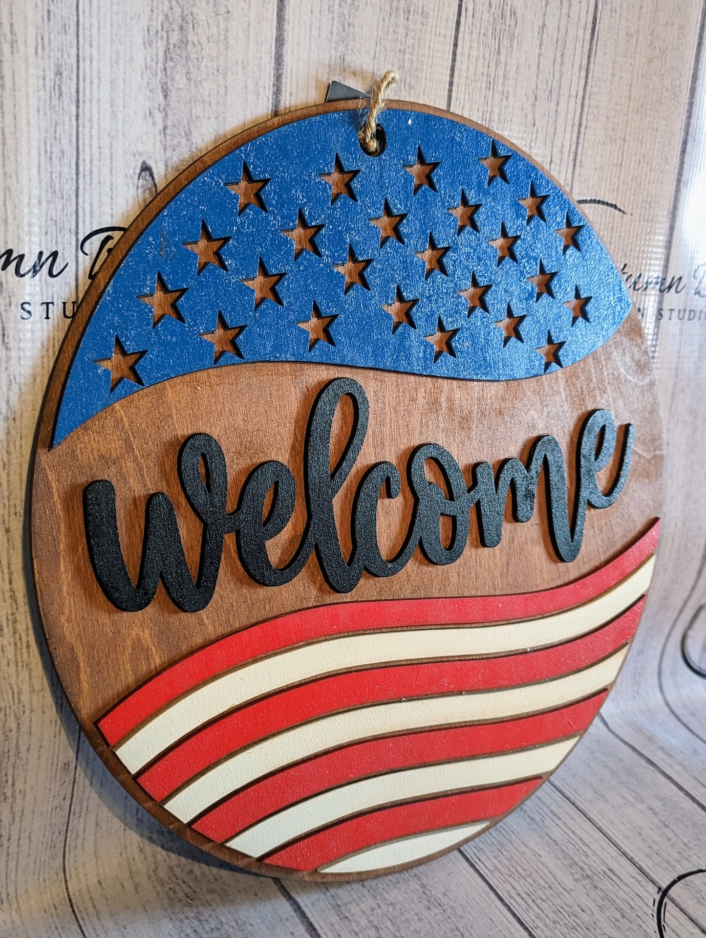 Welcome sign red white and blue